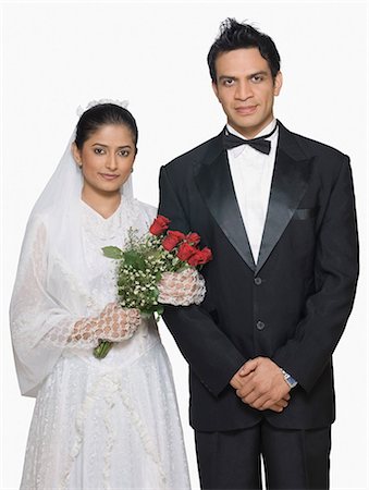 elegant man dresses - Portrait of a newlywed couple Stock Photo - Premium Royalty-Free, Code: 630-03479494