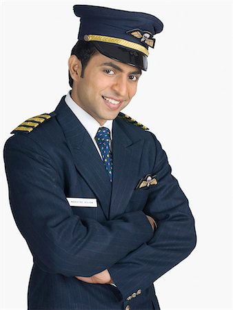 pilote (avion) - Portrait d'un sourire pilote Photographie de stock - Premium Libres de Droits, Code: 630-03479533