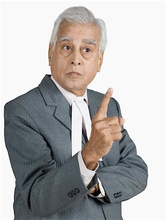 Close-up of a male lawyer pointing Stock Photo - Premium Royalty-Free, Code: 630-03479635