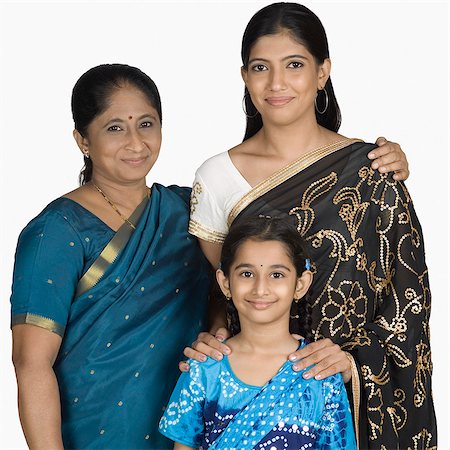 standing photos of girls in saree - Portrait of a family Stock Photo - Premium Royalty-Free, Code: 630-03479717