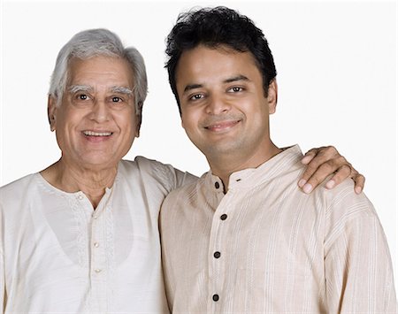 elderly father son not child - Portrait of a senior man with his arm around his son Stock Photo - Premium Royalty-Free, Code: 630-03479726