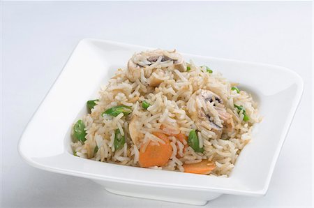 rice fried - Close-up of fried rice in a bowl Stock Photo - Premium Royalty-Free, Code: 630-03479975