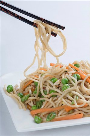 Close-up of noodles in a plate Stock Photo - Premium Royalty-Free, Code: 630-03479976