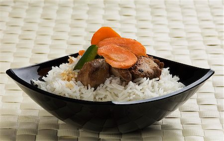 steamed rice - Close-up of meat with white rice in a bowl Stock Photo - Premium Royalty-Free, Code: 630-03479998