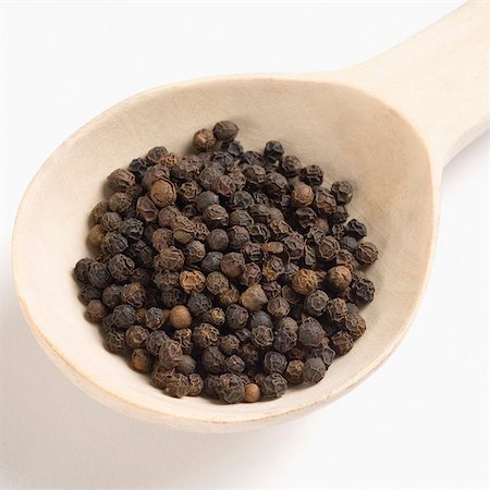 Black peppercorns in a ladle Stock Photo - Premium Royalty-Free, Code: 630-03480051