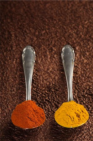 Spoons of paprika and ground turmeric Stock Photo - Premium Royalty-Free, Code: 630-03480098