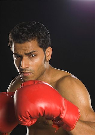 sweaty asian men - Boxer practicing boxing Stock Photo - Premium Royalty-Free, Code: 630-03480357