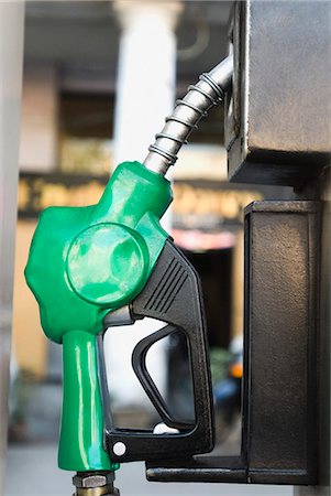 Close-up of a gas pump nozzle, Delhi, India Stock Photo - Premium Royalty-Free, Code: 630-03480450