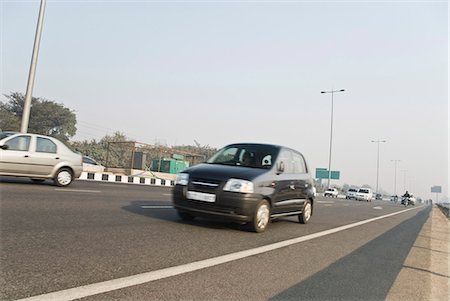 Voitures sur la route, Gurgaon, Haryana, Inde Photographie de stock - Premium Libres de Droits, Code: 630-03480514