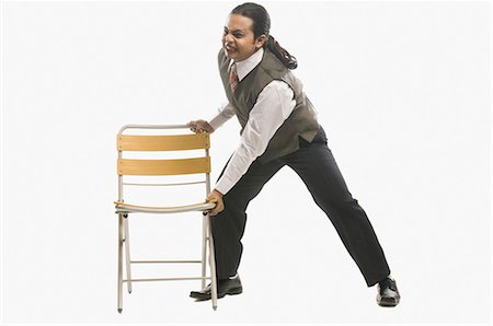simsearch:630-03480629,k - Mime holding a chair Stock Photo - Premium Royalty-Free, Code: 630-03480634
