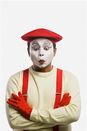 rolling eyes - Close-up of a mime puckering lips Stock Photo - Premium Royalty-Free, Code: 630-03480679