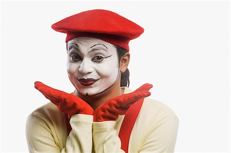 simsearch:630-03480642,k - Portrait of a mime gesturing Fotografie stock - Premium Royalty-Free, Codice: 630-03480694
