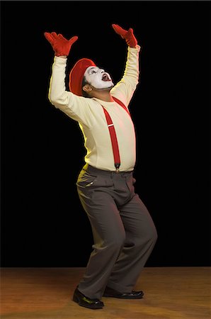 stage makeup - Mime performing on a stage Stock Photo - Premium Royalty-Free, Code: 630-03480707