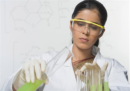 simsearch:649-07279800,k - Scientist experimenting in a laboratory Stock Photo - Premium Royalty-Free, Code: 630-03480793