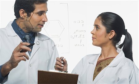 Scientists at work on a problem Stock Photo - Premium Royalty-Free, Code: 630-03480818