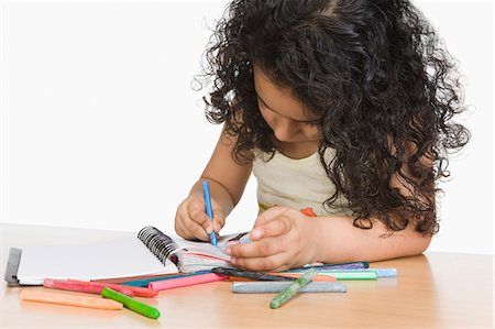 simsearch:630-03481209,k - Close-up of a girl drawing a picture with crayons Fotografie stock - Premium Royalty-Free, Codice: 630-03481199
