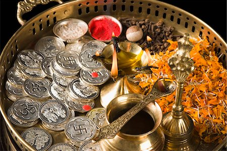 silver spoons photography - Close-up of religious offerings in a Diwali pooja thali Stock Photo - Premium Royalty-Free, Code: 630-03482080