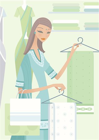 rack of clothes - Woman choosing sarees in a clothing store Stock Photo - Premium Royalty-Free, Code: 630-03482191