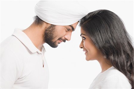 Couple smiling at each other Stock Photo - Premium Royalty-Free, Code: 630-03482778