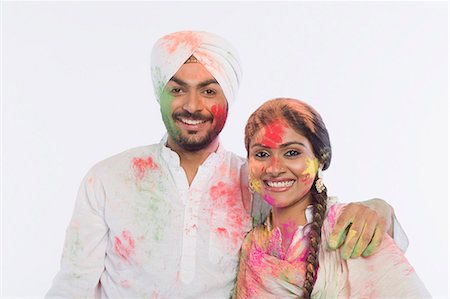 simsearch:630-03482912,k - Couple celebrating Holi Fotografie stock - Premium Royalty-Free, Codice: 630-03482889