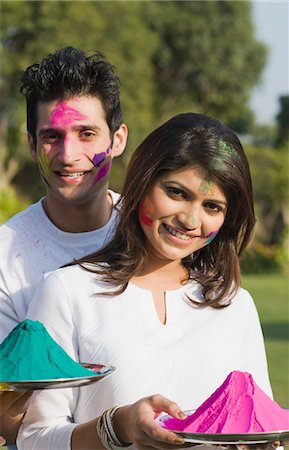 Couple celebrating Holi Stock Photo - Premium Royalty-Free, Code: 630-03482926