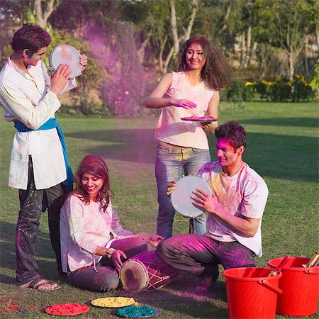 friends and buckets - Friends celebrating Holi Stock Photo - Premium Royalty-Free, Code: 630-03482968