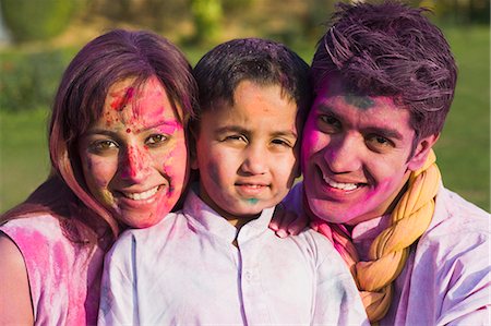 father son adult india - Portrait of a family celebrating Holi Stock Photo - Premium Royalty-Free, Code: 630-03483041