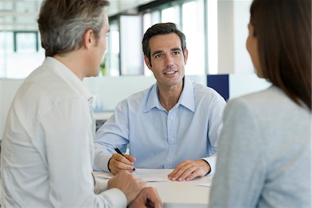 financial deal - Businessman meeting with client Stock Photo - Premium Royalty-Free, Code: 632-05401011