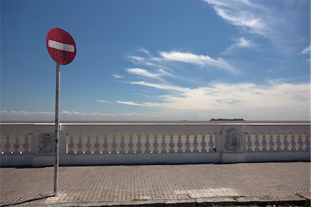 sidewalk not people - Do not enter sign against blue sky Stock Photo - Premium Royalty-Free, Code: 632-05401226