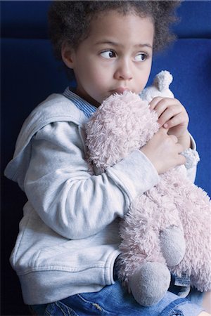 stuffed animal (toy) - Little girl holding stuffed toy, portrait Stock Photo - Premium Royalty-Free, Code: 632-05401250