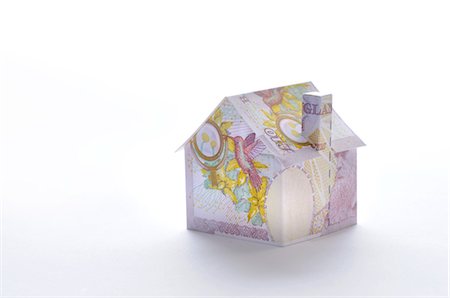 Model house folded with British pound banknote Foto de stock - Sin royalties Premium, Código: 632-05554000