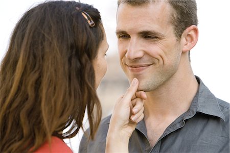 Woman caressing man's chin Stock Photo - Premium Royalty-Free, Code: 632-05554016