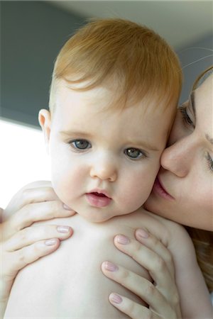 simsearch:632-05991180,k - Mother kissing baby's cheek Foto de stock - Sin royalties Premium, Código: 632-05554047