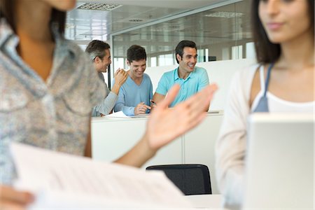 simsearch:632-05553837,k - Office workers laughing together Stock Photo - Premium Royalty-Free, Code: 632-05553420