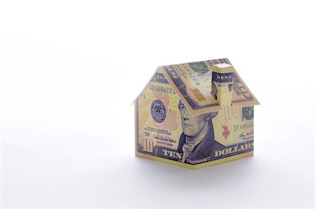 Model house folded with dollar bill Foto de stock - Sin royalties Premium, Código: 632-05553635