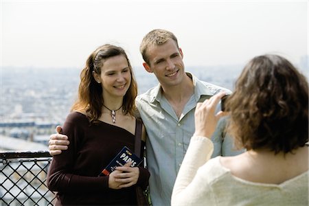 simsearch:632-05554045,k - Tourist couple posing for photograph at scenic lookout Foto de stock - Sin royalties Premium, Código: 632-05553736