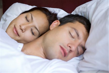 sleeping couple on the bed - Couple sleeping Stock Photo - Premium Royalty-Free, Code: 632-05553748