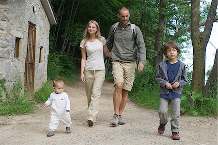 dad son walking - Family hiking in woods Stock Photo - Premium Royalty-Free, Code: 632-05604165