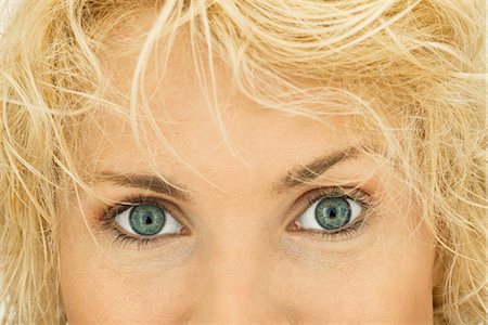fullframe - Blonde woman looking at camera, close-up Stock Photo - Premium Royalty-Free, Code: 632-05604275