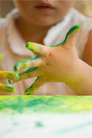 earth painting - Child finger painting, cropped Foto de stock - Sin royalties Premium, Código: 632-05604277