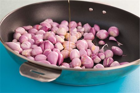 frying pan - Preparing shallots in pan Stock Photo - Premium Royalty-Free, Code: 632-05604364