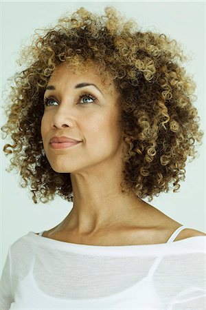 portrait beauty woman 40s - Woman looking up optimistically, portrait Stock Photo - Premium Royalty-Free, Code: 632-05604366