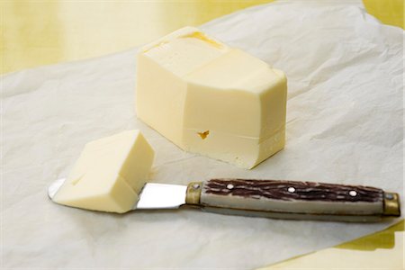 Cutting butter Foto de stock - Sin royalties Premium, Código: 632-05604405