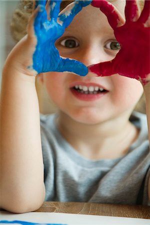 paint children - Little boy with hands covered in paint Stock Photo - Premium Royalty-Free, Code: 632-05604551