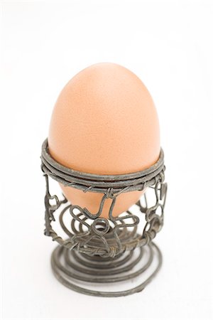 Egg in egg cup Foto de stock - Sin royalties Premium, Código: 632-05603782