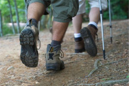 feet view from behind - Hikers walking on path, cropped Stock Photo - Premium Royalty-Free, Code: 632-05603869