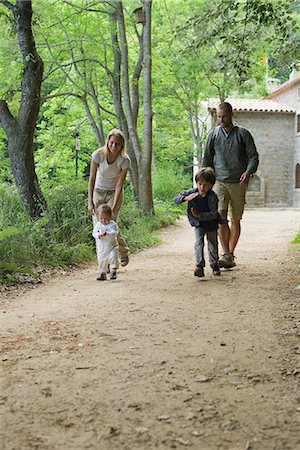 family hike - Family hiking in woods Stock Photo - Premium Royalty-Free, Code: 632-05603932