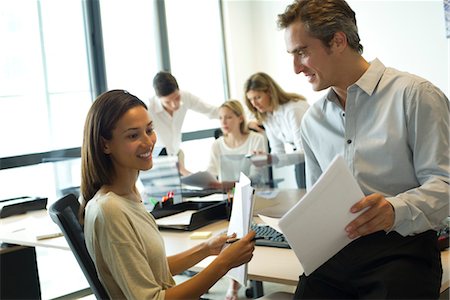 Colleagues working together in office Stock Photo - Premium Royalty-Free, Code: 632-05759481
