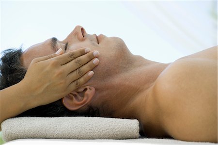 spa eyes closed - Man getting face massage Stock Photo - Premium Royalty-Free, Code: 632-05759569