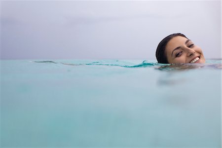 Woman swimming, portrait Stock Photo - Premium Royalty-Free, Code: 632-05759985